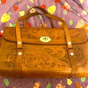 Vintage Genuine Leather Gaittan purse 12 inches long. 8 inches tall . Beautiful